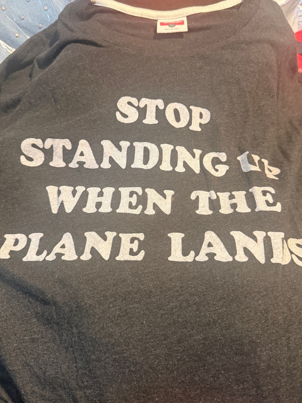 HOMAGE Stop Standing Up When The Plane Lands - Picture 2 of 6